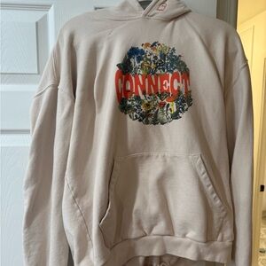 Woman’s LONELY GHOST Cream Hoodie with Graphic Design